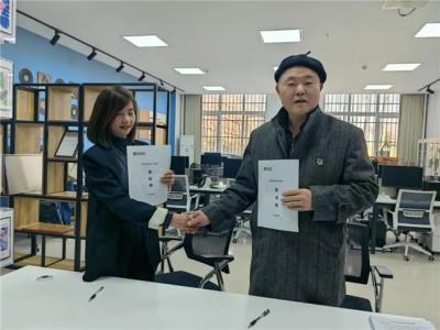艺术与传媒学院视觉传达设计工作室与河南万禾文化传播有限公司签订校企联合合同